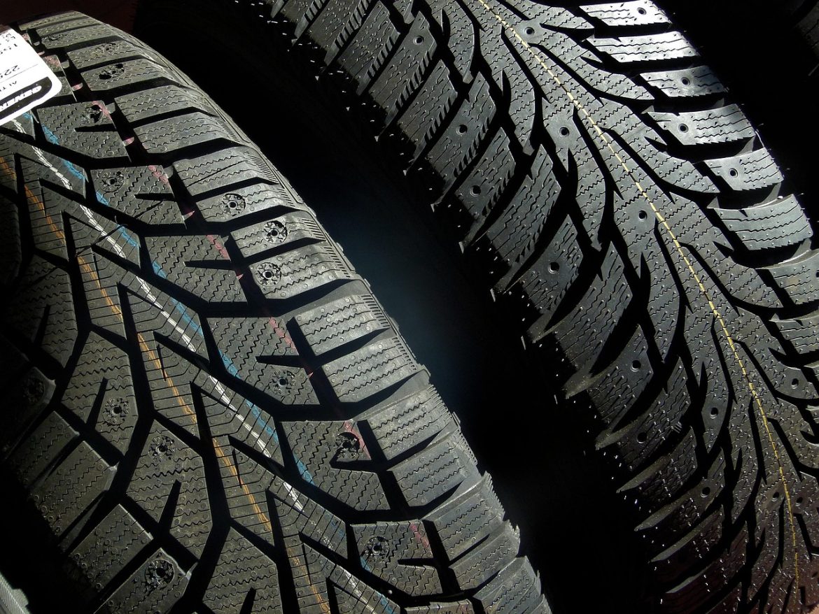 Close-up view of two PCR tire tread patterns showing detailed grooves, sipes, and directional design for enhanced traction and safety.
